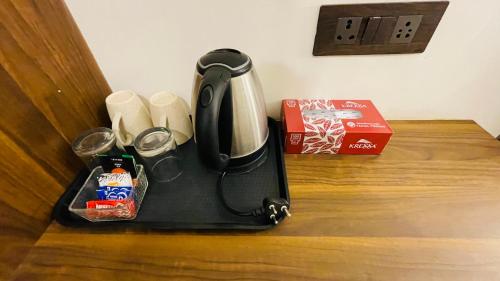 Kohvi ja tee valmistamise võimalus majutusasutuses The britishkothi