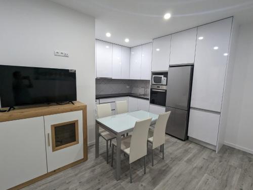 Η κουζίνα ή μικρή κουζίνα στο Apartamento Laranjeiras dois