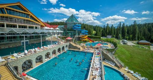 Πισίνα στο ή κοντά στο U Haliny Pokoje Stasikówka - Poronin