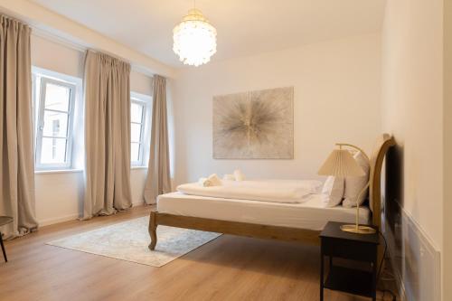 Postel nebo postele na pokoji v ubytování ღLiboria Villa Münter