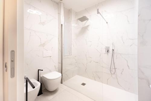 Ένα μπάνιο στο Manu Como Lake Apartment