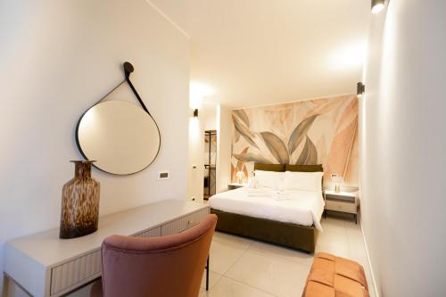 Ένα ή περισσότερα κρεβάτια σε δωμάτιο στο Manu Como Lake Apartment