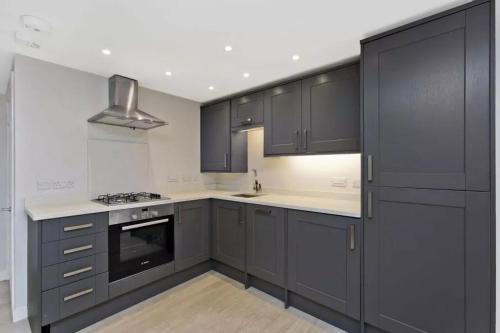 Køkken eller tekøkken på Coorie Cottage