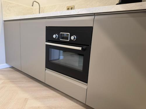 Η κουζίνα ή μικρή κουζίνα στο Family Double floor top view Art Apartment R3&5