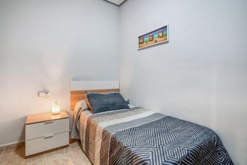 Ένα ή περισσότερα κρεβάτια σε δωμάτιο στο CaTere Estancia Bocairent