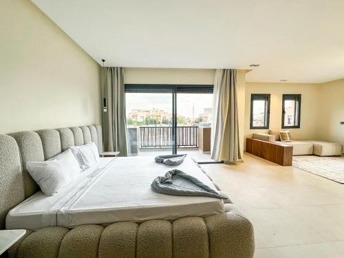 Postel nebo postele na pokoji v ubytování Villa CAN 2025 & Chill Marrakech