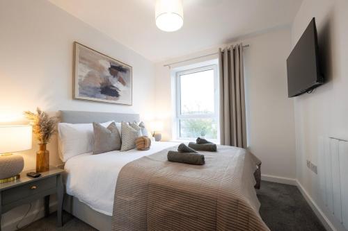 Postel nebo postele na pokoji v ubytování Modern 1BR Apt - Sleeps 4 - Parking - Balcony