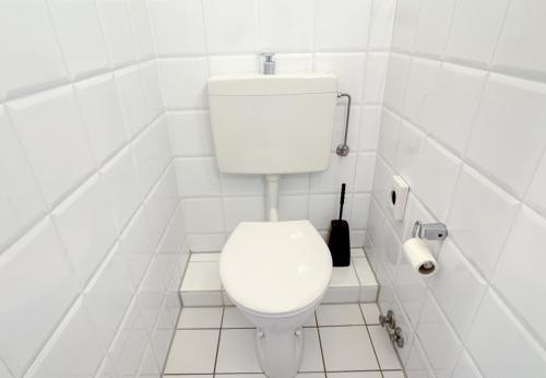 Et badeværelse på Hotelkamer voor één persoon in Marx 33-18