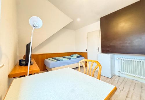 En eller flere senge i et værelse på Hotelkamer voor één persoon in Marx 33-18