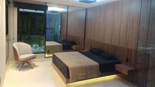 Χώρος καθιστικού στο Casa em Condomínio de luxo, ao lado do Autódromo de Goiânia