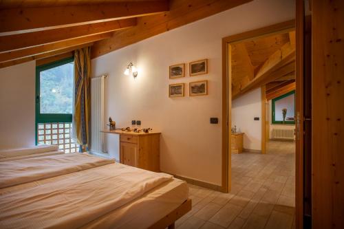 Giường trong phòng chung tại Agritur Bontempelli