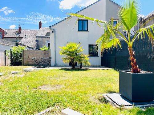 Zahrada ubytování Loft de charme avec parking, jardin et terrasse