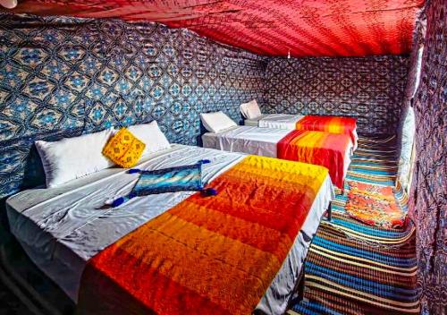 Ένα ή περισσότερα κρεβάτια σε δωμάτιο στο Moroccan Desert Camp