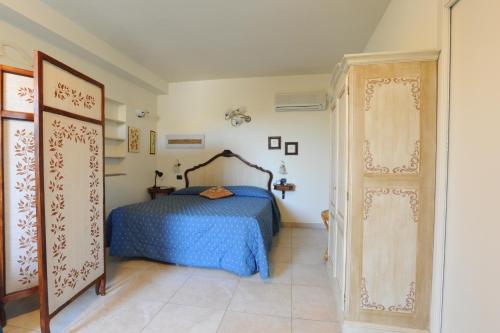 Postel nebo postele na pokoji v ubytování Hotel Ristorante Piccolo Chianti