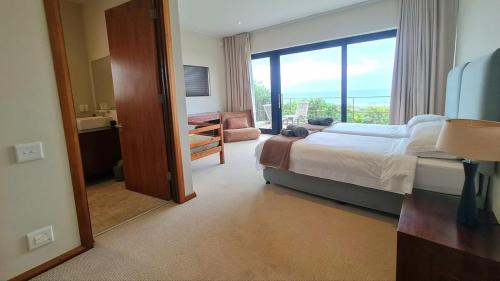 Postel nebo postele na pokoji v ubytování 114 Whales Haven - Keurboomstrand