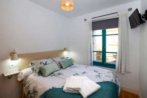 Postel nebo postele na pokoji v ubytování Apartamento san juan