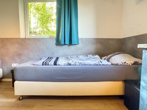 Postel nebo postele na pokoji v ubytování 33 - 42-B Gezellige vakantiewoning voor 2 personen