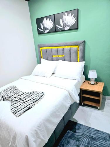 Postel nebo postele na pokoji v ubytování Evernice Guest House