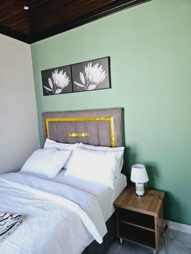 Postel nebo postele na pokoji v ubytování Evernice Guest House