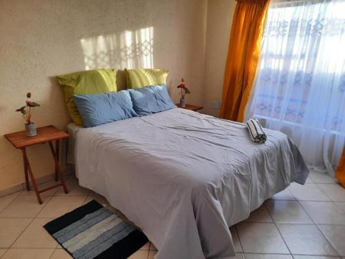 Voodi või voodid majutusasutuse Legaeng Cottage - Serenity toas