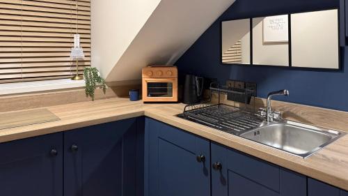 Η κουζίνα ή μικρή κουζίνα στο URBAN OAKS stylish city centre living