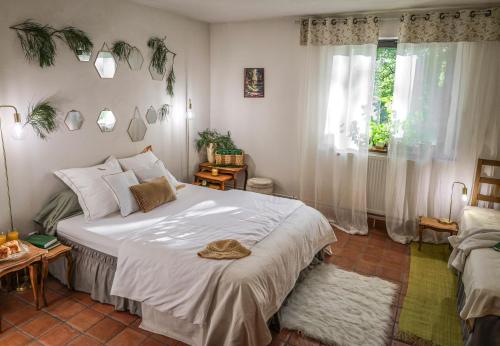 Postel nebo postele na pokoji v ubytování Gîte de plain-pied sans escaliers, Dordogne