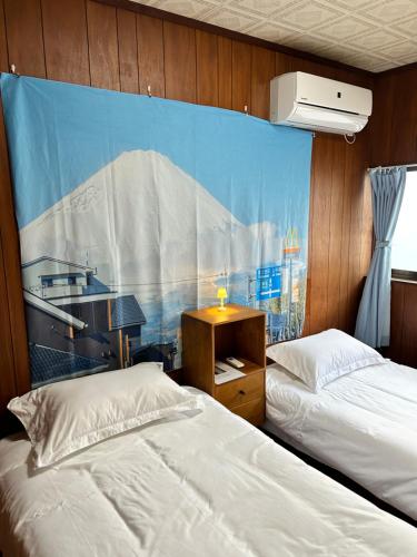 Postel nebo postele na pokoji v ubytování i Home Osaka ZEN NEST 一户建