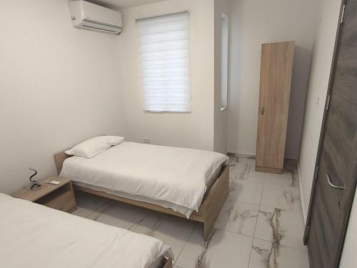 Ένα ή περισσότερα κρεβάτια σε δωμάτιο στο Il-Gawwija Suite Sannat