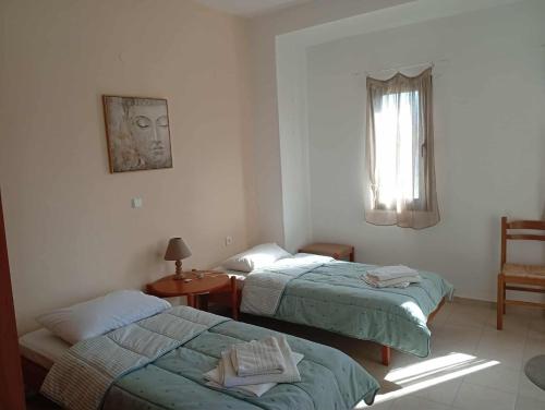 Postel nebo postele na pokoji v ubytování The Twin Bridges