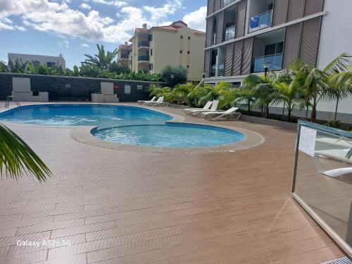 Swimmingpoolen hos eller tæt på Highrise Madalenas Apartment