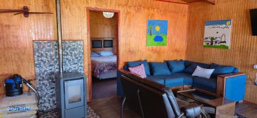 Χώρος καθιστικού στο Cabañas murmullo del rio lenca