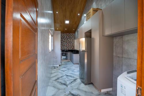 Ένα μπάνιο στο Carcará Vacation Homes