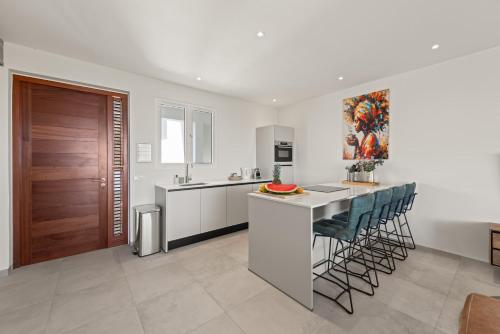 Kuchyň nebo kuchyňský kout v ubytování Caribbean Lounge - Aquamarine 4