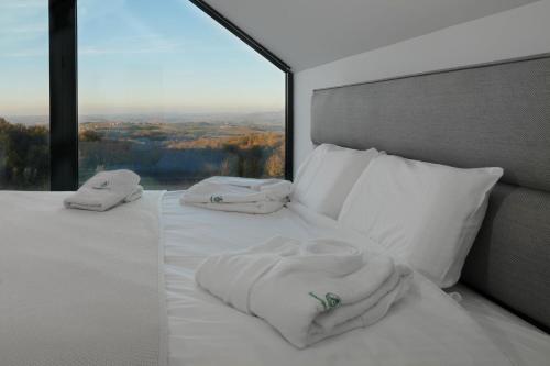 Ένα ή περισσότερα κρεβάτια σε δωμάτιο στο Oasis House