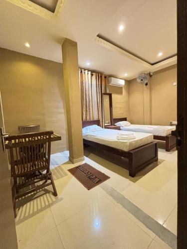 Postel nebo postele na pokoji v ubytování Airport City Hotel