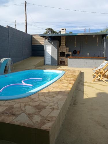 Bazén v ubytování Espaço de Lazer Poço Valioso nebo v jeho okolí