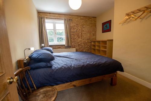 Postel nebo postele na pokoji v ubytování Spacious 3 bedroom country house