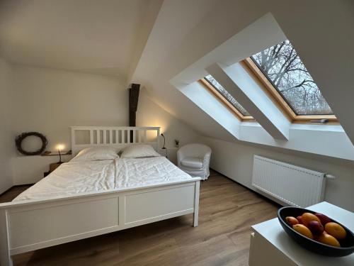 Ένα ή περισσότερα κρεβάτια σε δωμάτιο στο Penzion Eisenberg