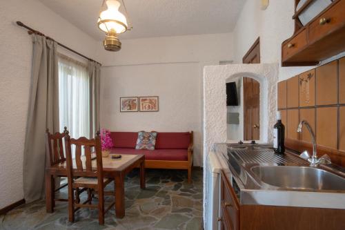 Kuchyň nebo kuchyňský kout v ubytování Hotel Agapi Apartments