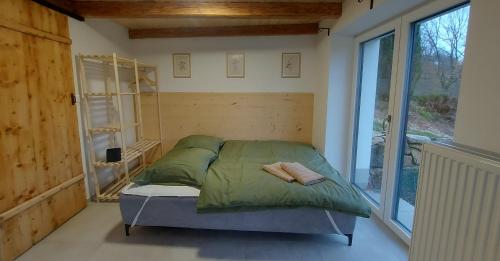 Кровать или кровати в номере Lučany nad Nisou 804