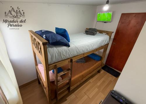 Postel nebo postele na pokoji v ubytování Cabaña Mirador del Paraíso