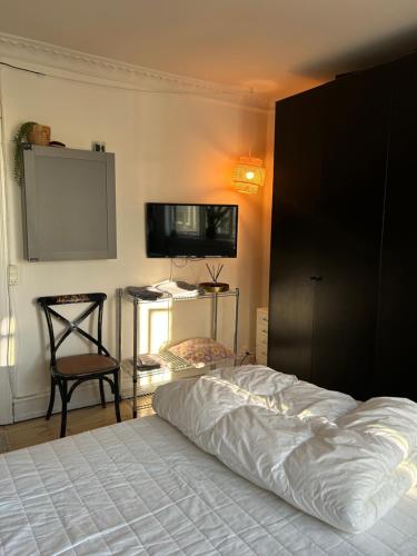 Ένα ή περισσότερα κρεβάτια σε δωμάτιο στο Apartment in heart of Amager