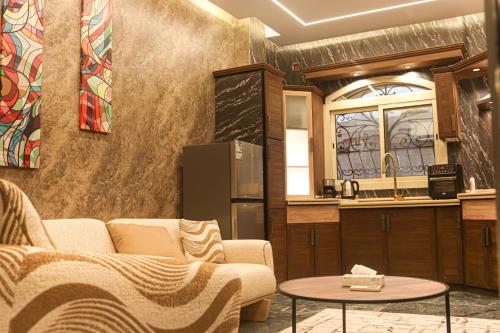 Χώρος καθιστικού στο اجنحة احسان الفاخرة