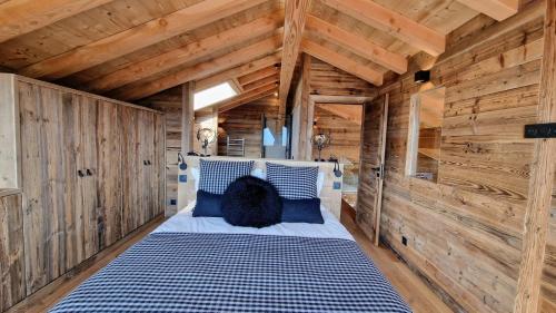 Ένα ή περισσότερα κρεβάτια σε δωμάτιο στο Chalet 1ère Étoile une vue à couper le souffle