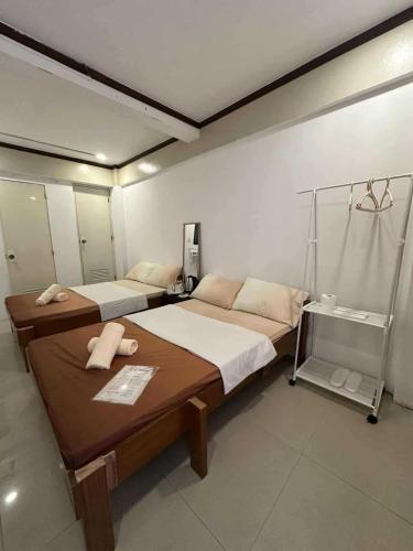 Postel nebo postele na pokoji v ubytování OYO 1180 Casa Del Sul