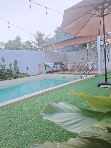 Φωτογραφία από το άλμπουμ του Sarang A Cottage with private pool σε Sungai Petani