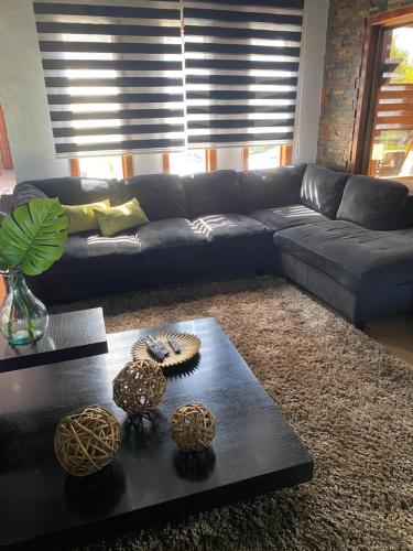 Χώρος καθιστικού στο Casa con Piscina y Cama elástica