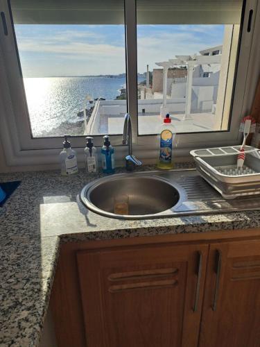 Kuchyň nebo kuchyňský kout v ubytování Appart Kelibia View Sea