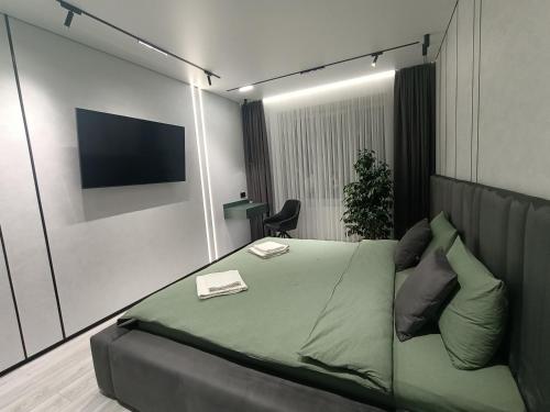 Posezení v ubytování Сучасний люкс з панорамним виглядом!