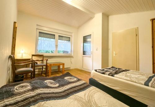 Ένα ή περισσότερα κρεβάτια σε δωμάτιο στο Modern appartement voor 2 personen In Friedeburg - 79-5